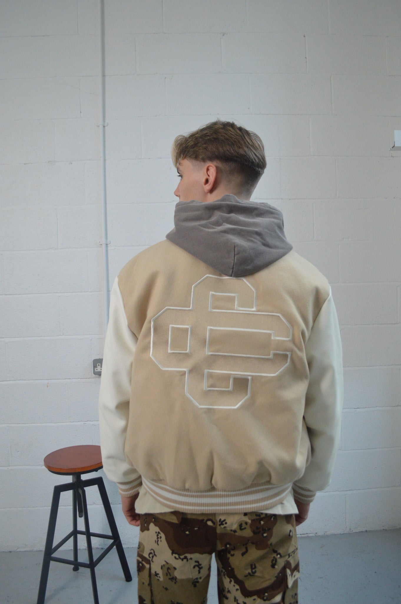 THE COUTURE CLUB EMBLEM SCRIPT VARSITY BOMBER JACKET