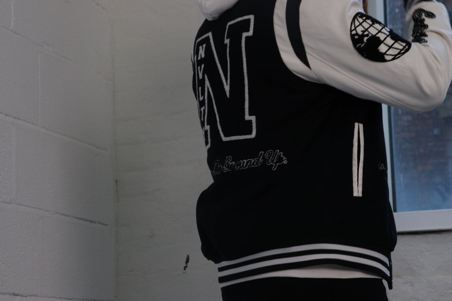 NVLTY VARSITY BLACK BOMBER JACKET