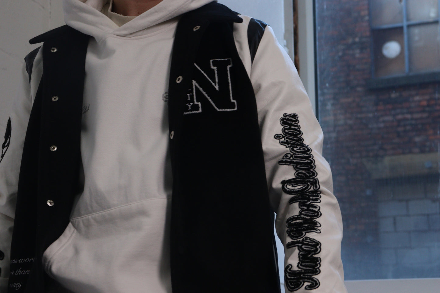 NVLTY VARSITY BLACK BOMBER JACKET